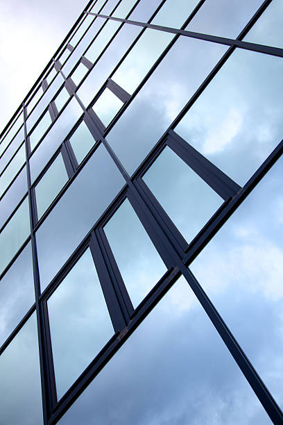 istock facade of office with reflections 166613158