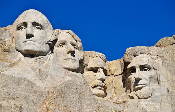 Mount Rushmore National Monument The famous Mount Rushmore National Monument in South Dakota on a sunny day. Nice travel background. presidents day stock pictures, royalty-free photos & images