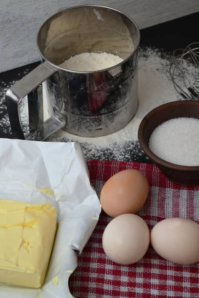 istock sifted flour, eggs and butter on the table 1666143331