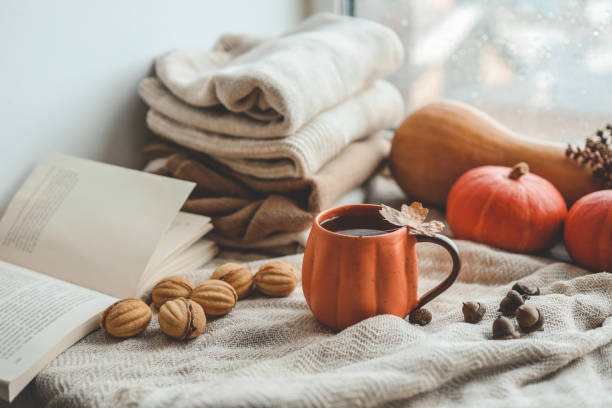istock Cup of hot tea and a leaf, autumn mood 1666164049