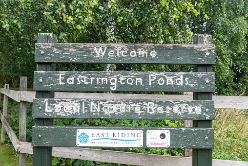 Eastrington, United Kingdom - August 13th, 2023: Welcome sign at the entrance of the Eastrington Ponds local nature Reserve