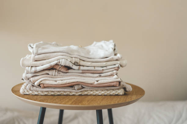 istock Stack of children's things on a wooden pedestal 1666173208
