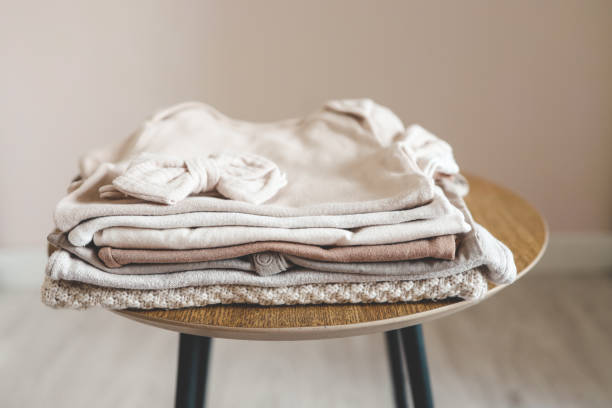 istock Stack of children's things on a wooden pedestal 1666191436
