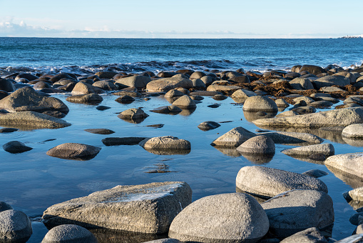 Utakleiv beach in sunny cold weather, winter, Steinsfjorden. Vestvagoya-Nordland fylke-Norway.