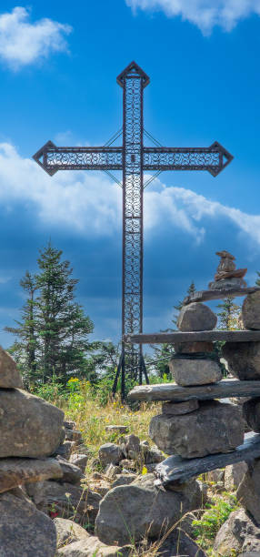 istock Pretty cross on a mountain in Quebec in Canada 1666205745