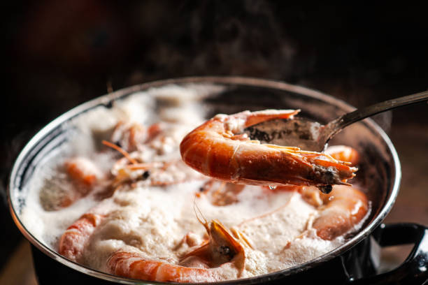 istock Large king prawns are boiled in a saucepan. 1666206616