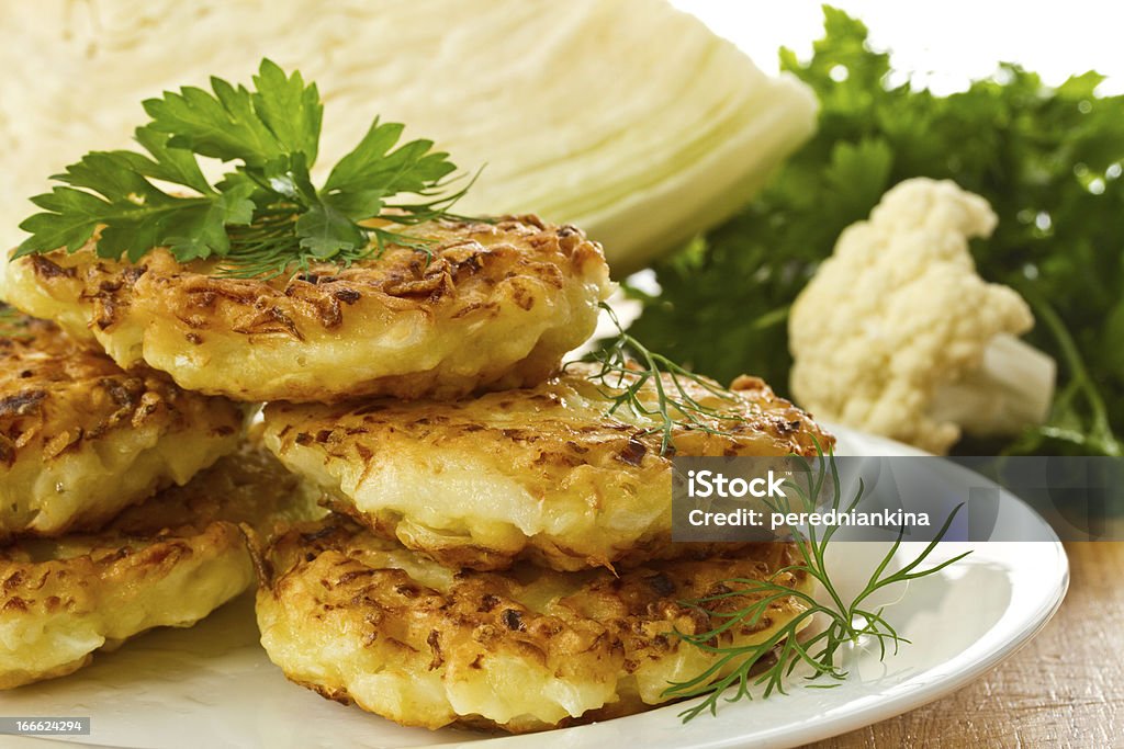 cabbage pancakes vegetable pancakes with cabbage on a white plate Breakfast Stock Photo