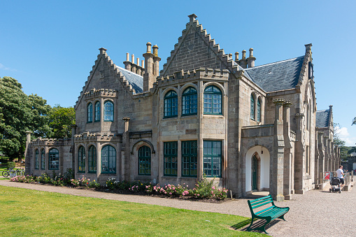 Millport, Scotland, UK - 9th July 2023: Part of The Garrison in Millport, originally built in 1745 as a private home and rebuilt with a modern interior following an extensive fire in 2001. It is now a community hub, featuring a museum, a cafe, a library and a craft shop.