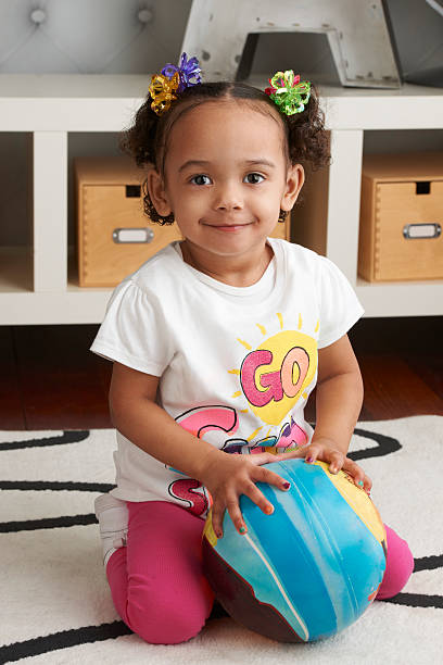 istock Toddler Girl Playing 166627463