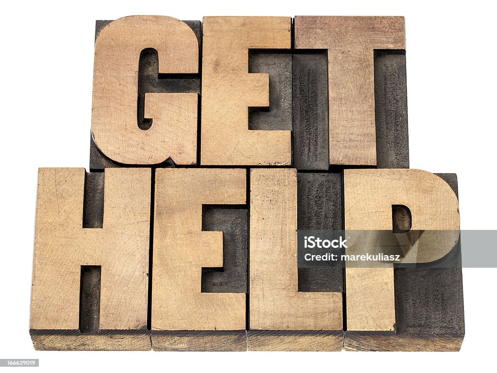 get help in wood type get help - isolated text in vintage letterpress wood type printing blocks Advice Stock Photo