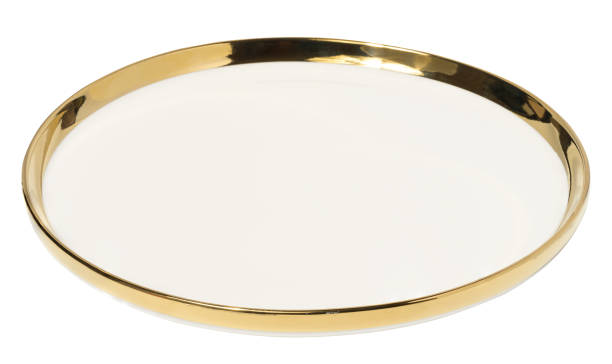 istock Empty round ceramic white plate with a gilded edge on a white isolated background, top view 1666318855