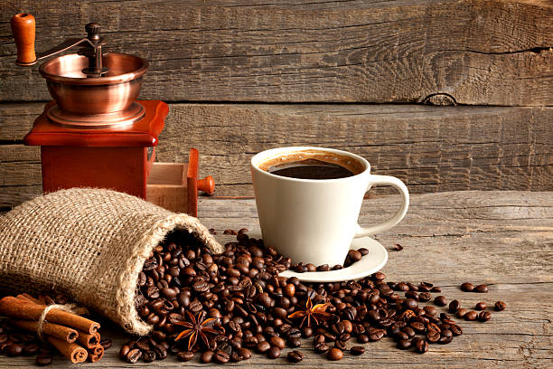 istock Cup of coffee and grinder vintage still life 166631909