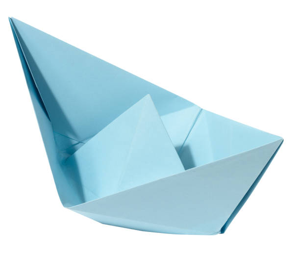 istock Blue paper boat on a white isolated background 1666319397