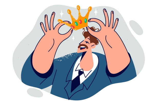 istock Business man leader puts crown on head, symbolizing superiority over colleagues and competitors 1666332148