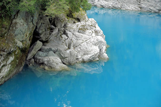 On the West Coast image taken while on the walk around the track at the Hokitika Gorge and the surrounding Hokitika Gorge Scenic Reserve are a major tourist destination some 33 kilometres or 40 minutes drive inland from Hokitika, New Zealand. Since August 2020, a second suspension bridge over the Hokitika River at the gorge provides the opportunity for a round track