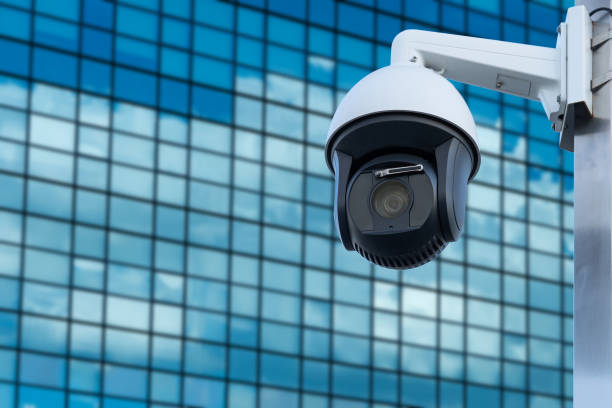 istock Security, CCTV camera in the office building. Close-up 1666354858