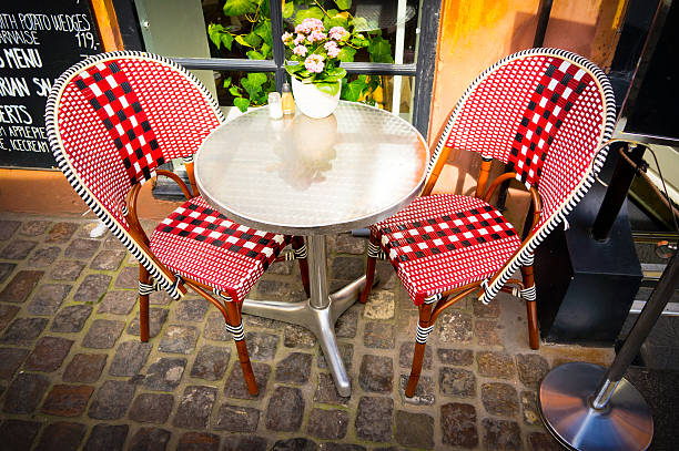 istock Vintage old fashioned cafe chairs with table in Copenhagen, Denm 166636997