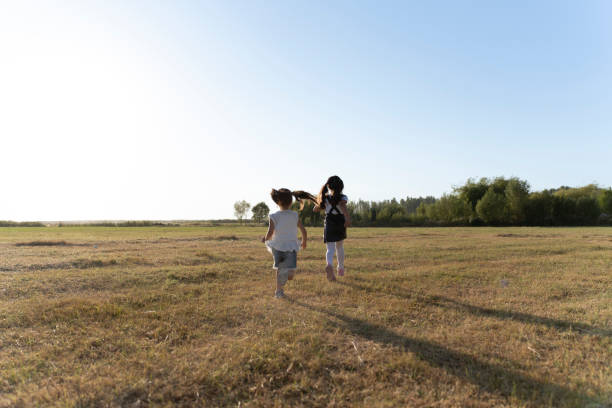 istock Children having fun in nature. 1666370527