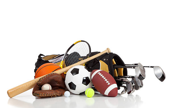 Assorted sports equipment on a white background stock photo
