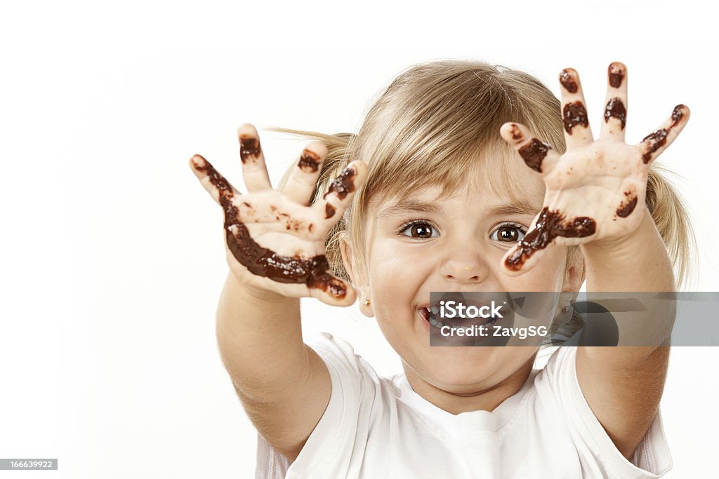Pequena menina com chocolate - Foto de stock de Chocolate royalty-free