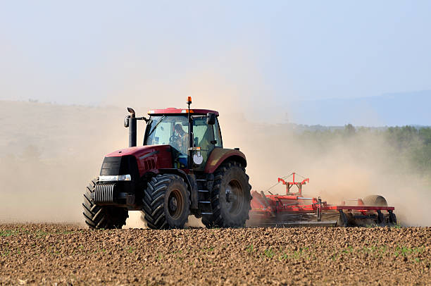 istock Agriculture vehicle preparing land for autumn cultures 166640229