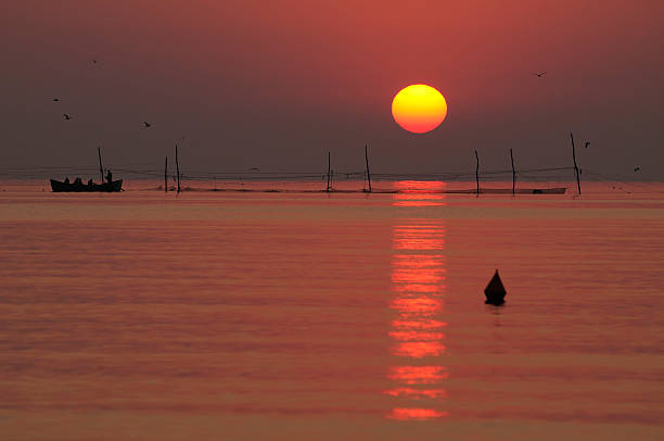 istock Fishing at sunrise time 166640242