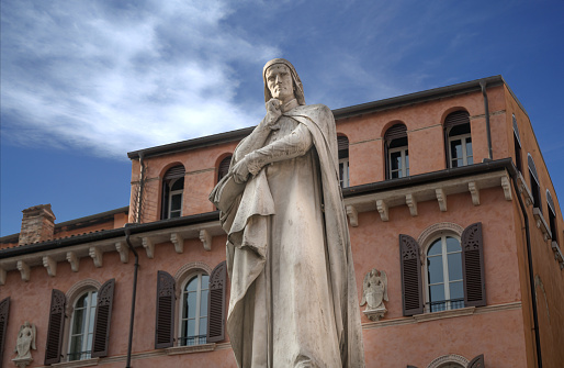The Statue of Dante Alighieri is a monument to Dante Alighieri in Piazza Santa Croce, outside the Basilica of Santa Croce, in Florence, Italy. Erected in 1865, it is the work of the sculptor Enrico Pazzi.
