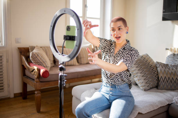 istock Young woman is recording a vlog 1666555029