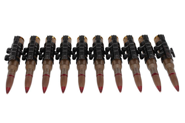 istock Ammunition belt with cartridges for heavy machine gun isolated on white. 1666562236