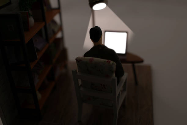 istock Over the shoulder view of laptop computer in the dark 1666570734