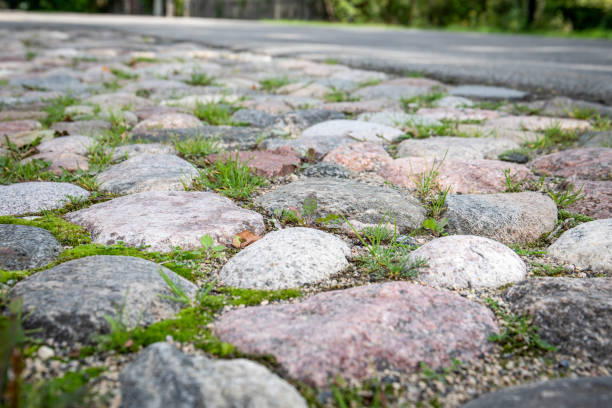istock Cobblestone pavement. traffic, improvement and urban environment 1666622266
