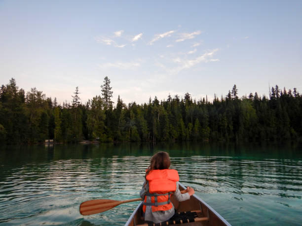 istock Girl canoeing on vacation 1666623354