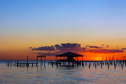 The sun sets over Mobile Bay as seen from Fairhope, AL, USA, on Nov. 22, 2020.