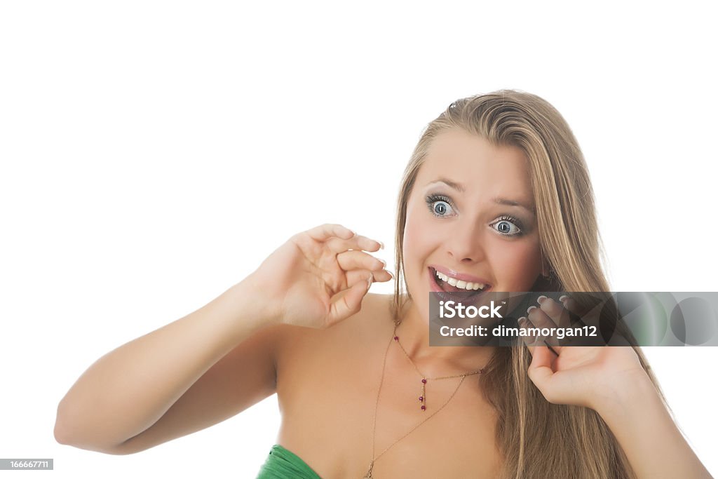wondering portrait of happy exclaiming sexy blond girl smiling against pure white background 20-24 Years Stock Photo
