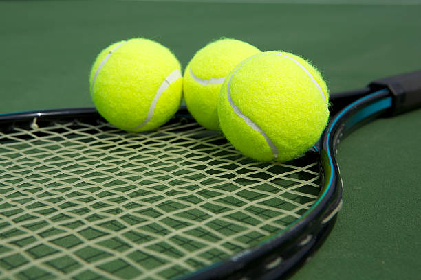 istock Tennis Balls on a Racket 166667931