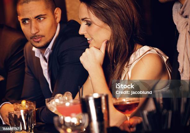Gorgeous Woman With Boyfriend At The Bar Stock Photo - Download Image Now - Adult, After Work, Alcohol - Drink