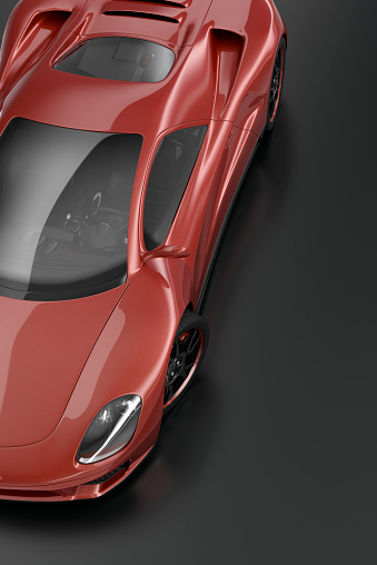 Overhead view of a modern red sports car. Unique generic car design.  Designed and modelled entirely by myself. Very high resolution 3D render. All markings are ficticious.