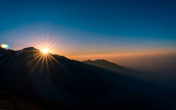 istock Gloomy Sunrise view over the Mountain 1666701671