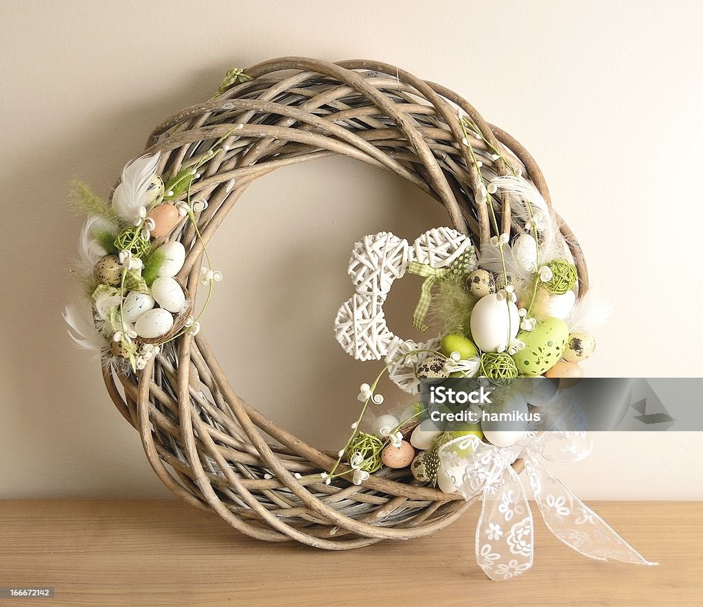 Easter decoration Easter decoration on the table, wreath with eggs. Animal Egg Stock Photo
