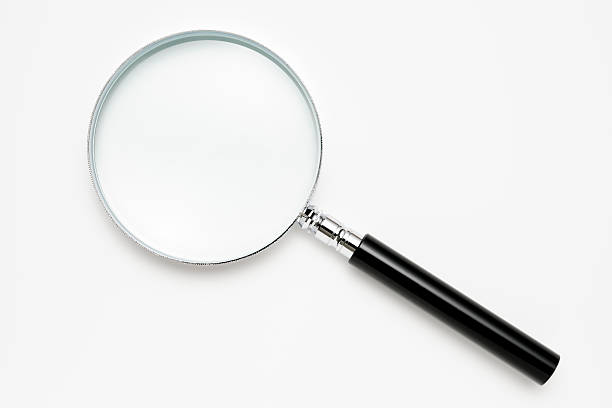 Isolated shot of magnifying glass on white background Magnifying glass isolated on white background with two clipping path. (inside & outside) isolated on white stock pictures, royalty-free photos & images