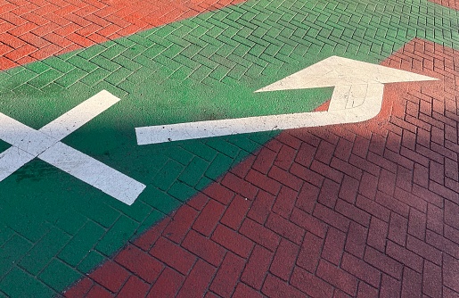 Walking and Road Sign (Arrow on the Road)