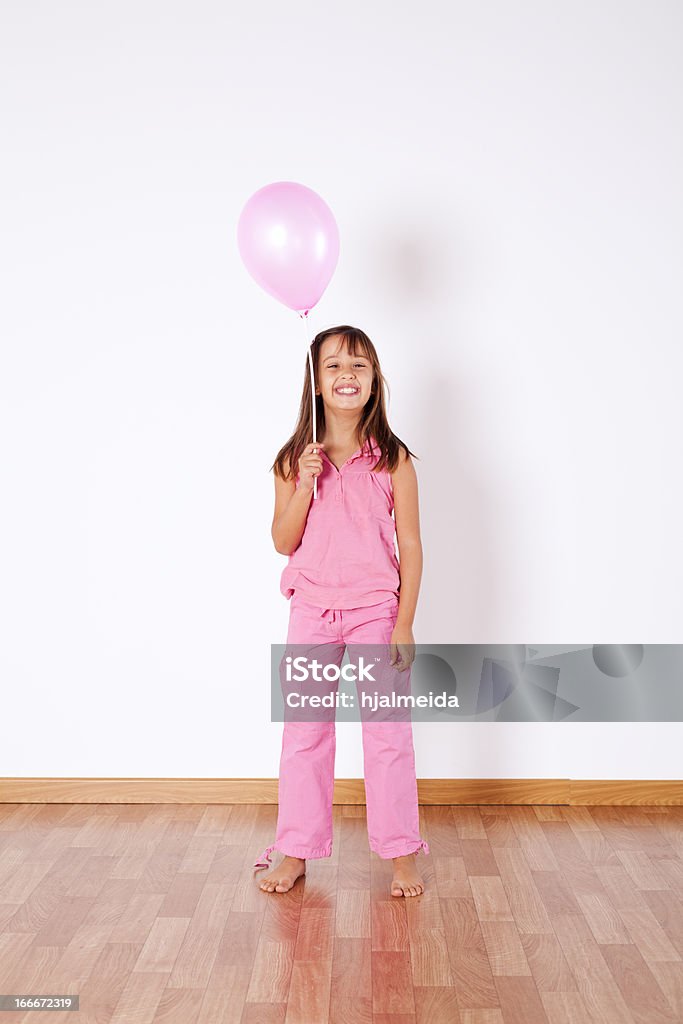 Bambina con palloncini di colore - Foto stock royalty-free di Allegro