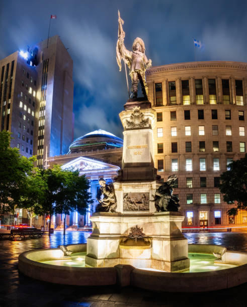 Historic Place D'Armes Square in Old Montreal Place D'Armes Square in historic Old Montreal featuring a statue of Paul Chomedey de Maisonneuve,  one of Montreal's most prominent founders. place darmes montreal stock pictures, royalty-free photos & images