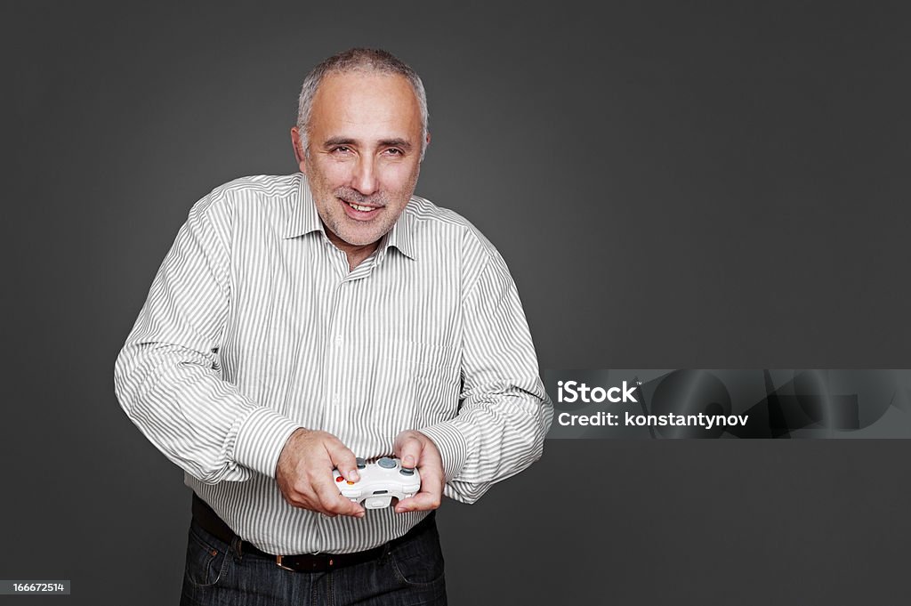 웃는 노인 남자, 조이스틱 - 로열티 프리 Brand Name Video Game 스톡 사진