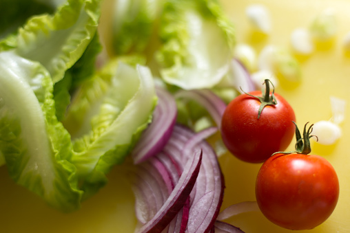 Preparing Salad (Close-Up): Washed Lettuce, Onion, Cherry Tomatoes