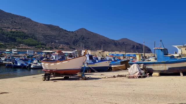 Local harbor of Favignana of Egadi islands in Sicily, Italy. Slow-motion