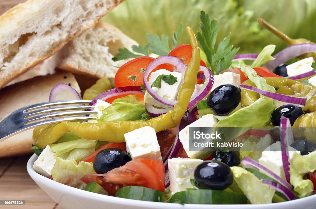 Greek salad Greek salad with feta cheese, olives and pita bread Appetizer Stock Photo