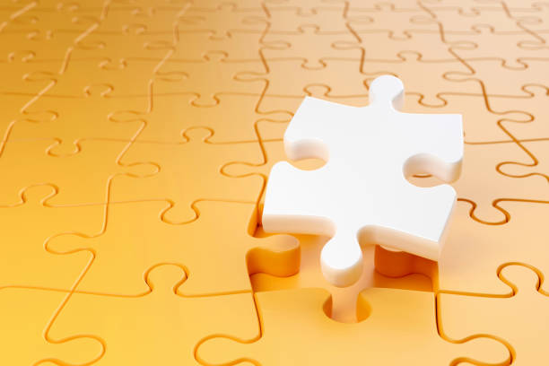 istock White jigsaw puzzle among a yellow jigsaw puzzle that shows outstanding Differentiation 1666768874
