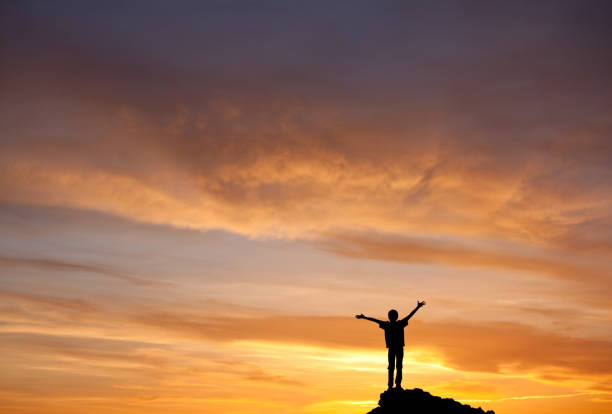 istock Silhouette of Young Boy on a Mountain 166678572