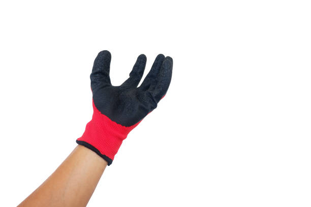 istock Hands of a man with gloves for pulling grass 1666792695